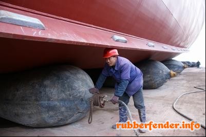 before launching, workers are charging air to airbags