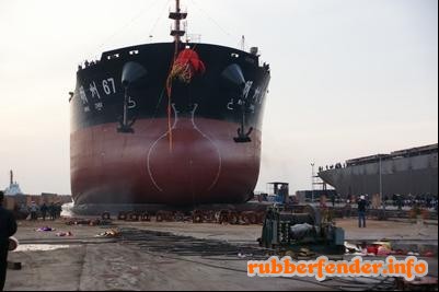 the huge ship rolls on airbags on slipway